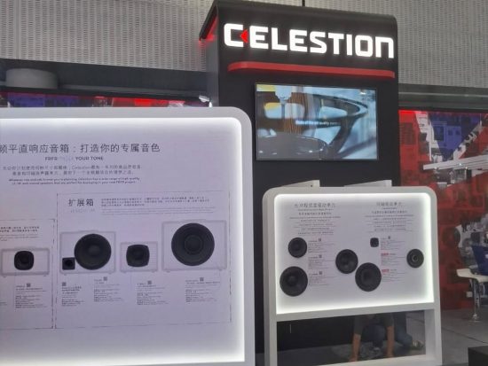 Celestion stand featuring loudspeaker components and illuminated product displays
