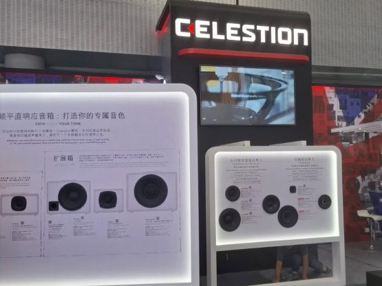 Celestion stand featuring loudspeaker components and illuminated product displays