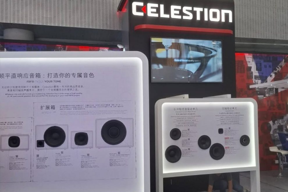 Celestion stand featuring loudspeaker components and illuminated product displays