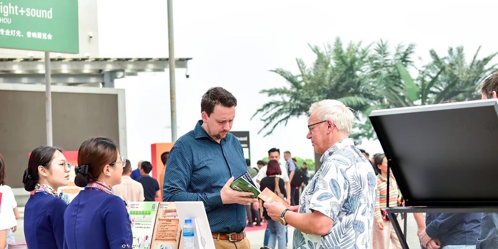 International buyers gather information at the info counter at Prolight + Sound Guangzhou