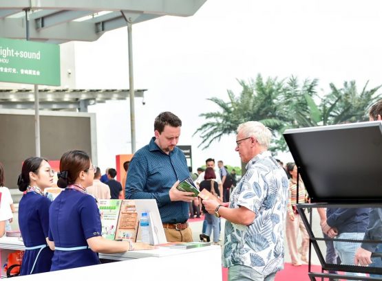 International buyers gather information at the info counter at Prolight + Sound Guangzhou