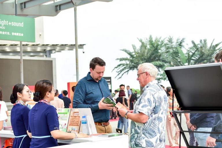 International buyers gather information at the info counter at Prolight + Sound Guangzhou