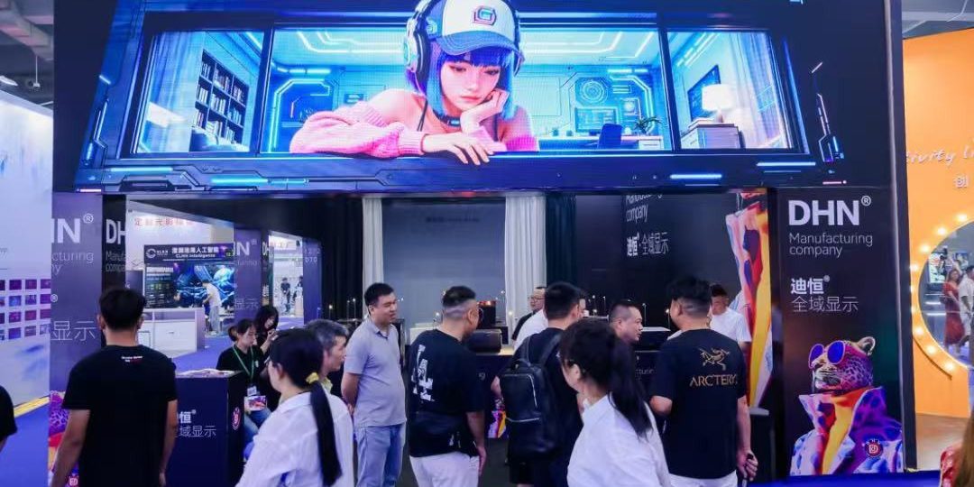 LED display at the DHN stand featuring trade visitors and digital imagery