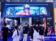LED display at the DHN stand featuring trade visitors and digital imagery