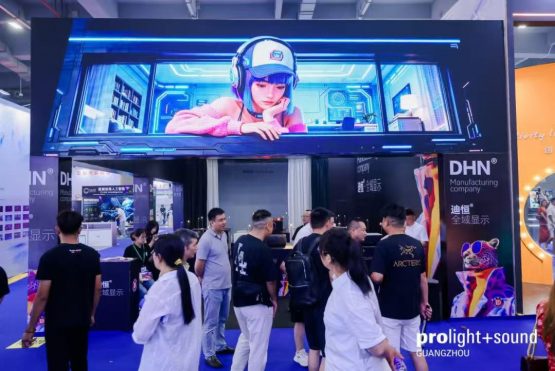 LED display at the DHN stand featuring trade visitors and digital imagery
