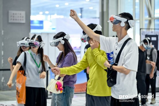 Visitors try out VR headsets at Prolight + Sound Guangzhou